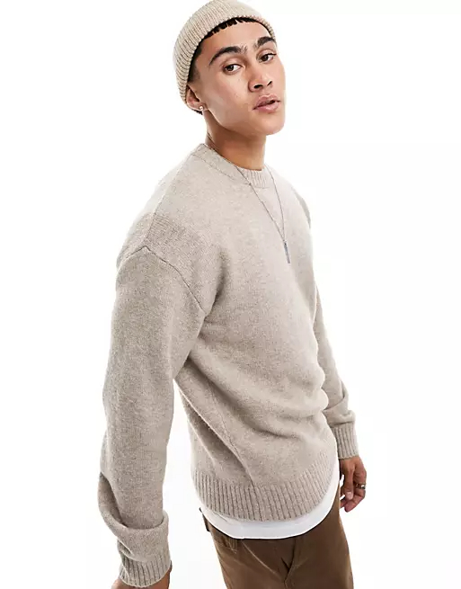 The V-neck sweater, a staple in men's fashion, is an essential wardrobe piece that exudes sophistication and versatility. 